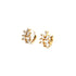 The Zirconia Stones Huggies earrings, crafted with 10k gold filled, showcase exquisite clusters of clear, baguette-shaped crystals in leaf-like designs. The zirconia stones provide an enchanting sparkle against the pristine white backdrop.